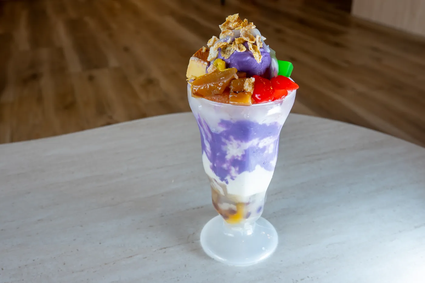Halo-halo dessert cup with layers and ube